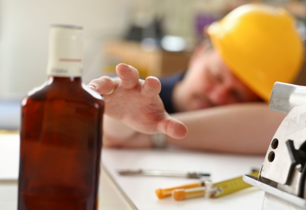 man reaching for medication
