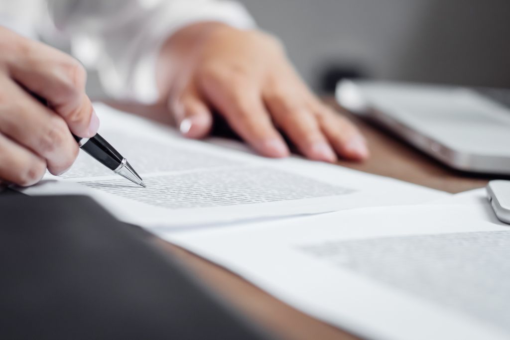 HR professional in Meridian reviewing updated workplace drug testing policies at a desk