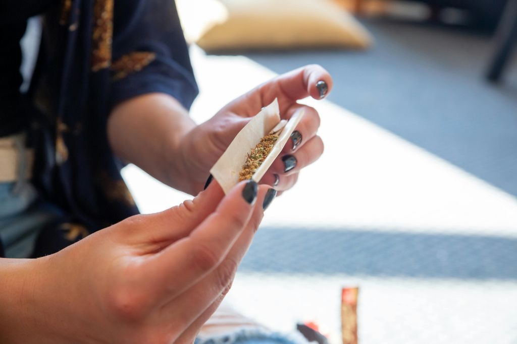 Idaho HR manager discussing workplace marijuana policy with an employee in an office setting