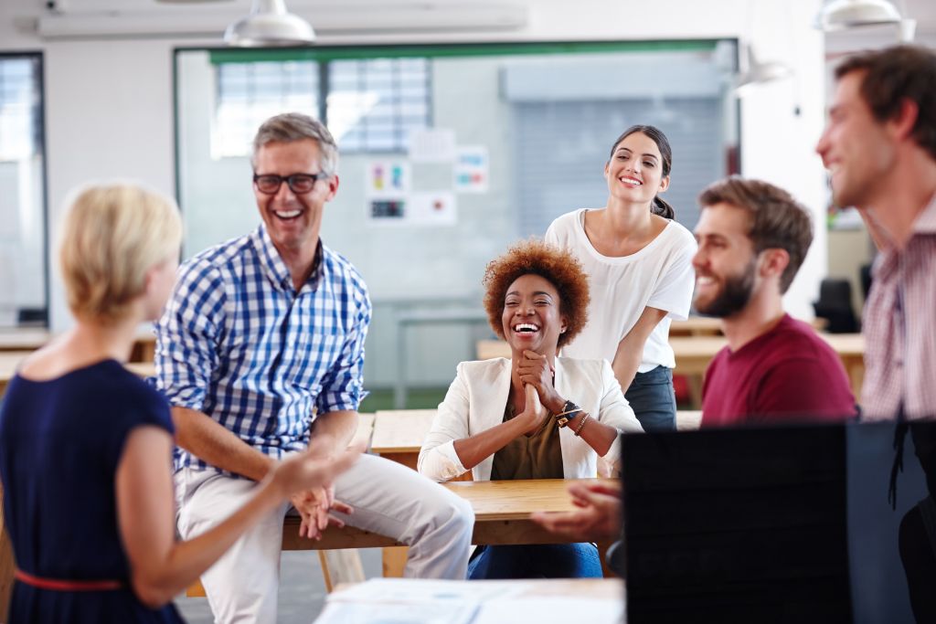 people smiling in office